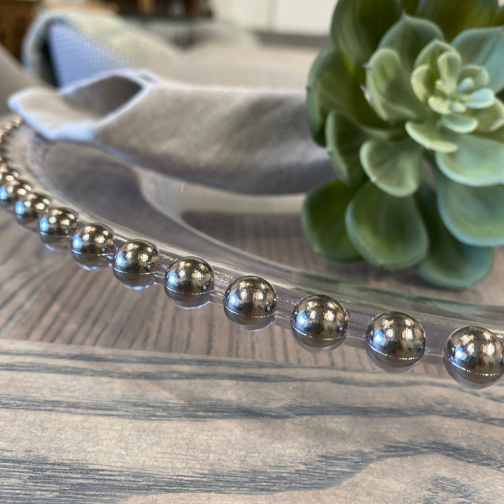 Chargeur à perles argentées