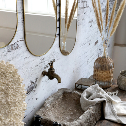 Miroir ovale avec cadre en laiton