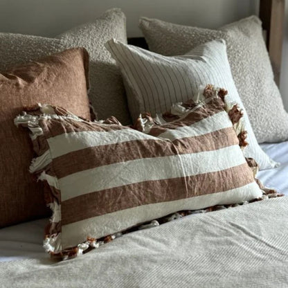 Coussin à larges rayures rouille