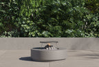 Ensemble de table et foyer en béton rond